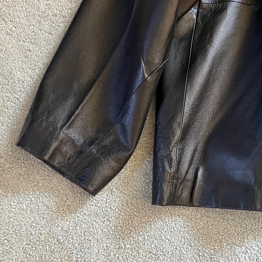 Sleek Black Leather Performance Jacket - image 7